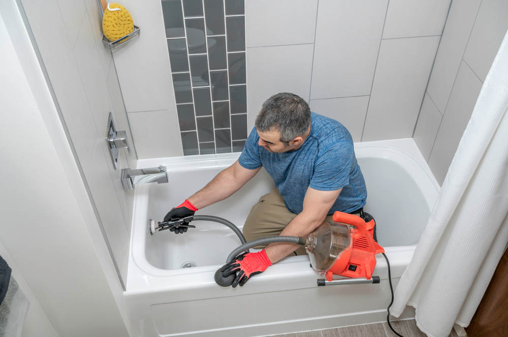 plumber drain snaking bathtub Seattle WA