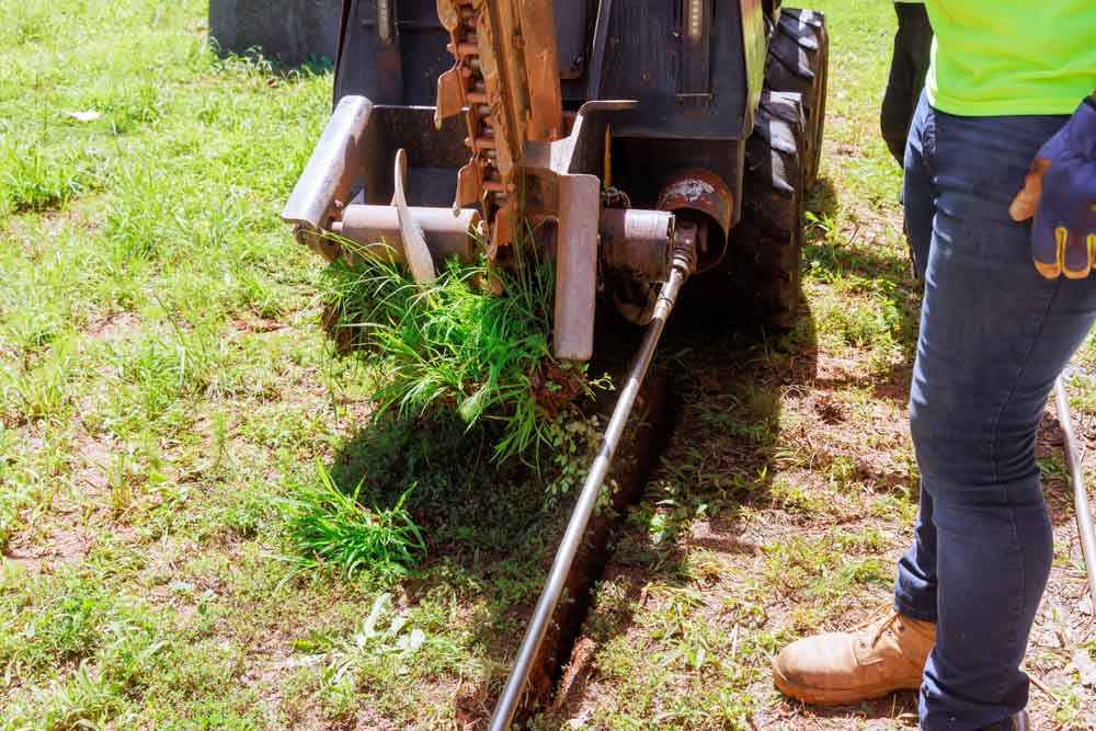 plumbing team preparing for trenchless repair project