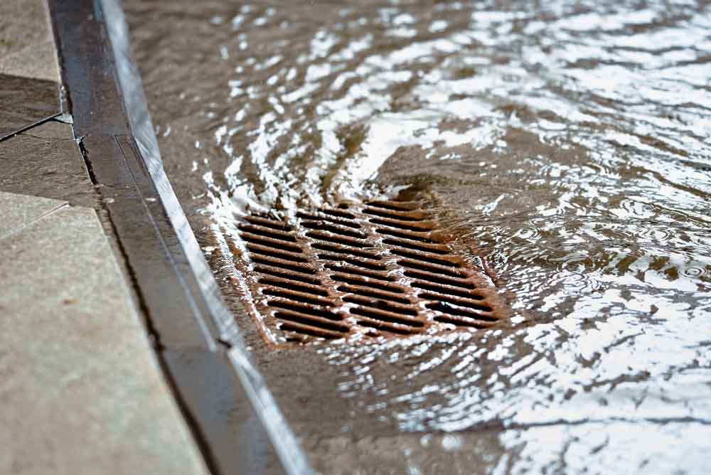 stormwater flowing down the drain